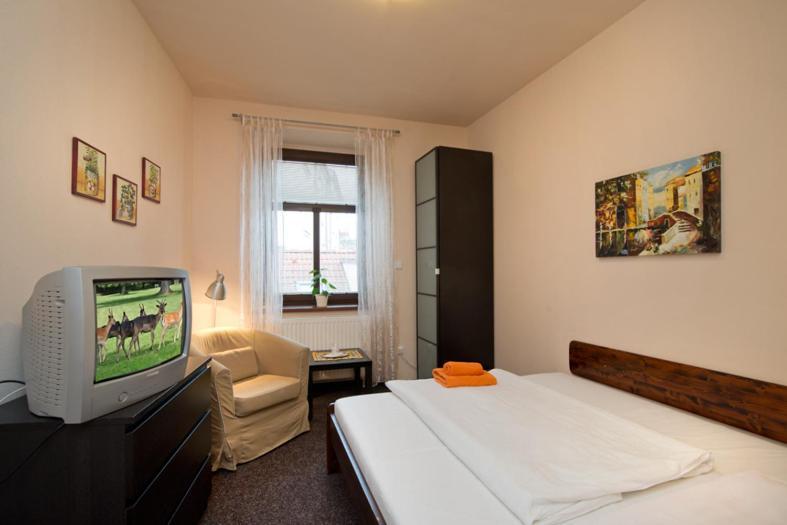Hotel U Zlateho Byka Písek Szoba fotó